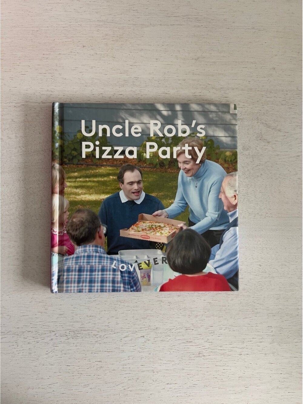 Lovevery Uncle Rob’s Pizza Party hardcover book